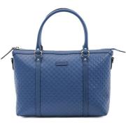 Handtas Gucci GG Marmont mini schoudertas in blauw leer