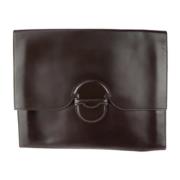 Pre-owned Leather clutches Hermès Vintage , Brown , Dames