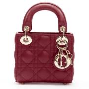 Pre-owned Leather handbags Dior Vintage , Red , Dames