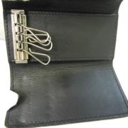 Pre-owned Leather wallets Louis Vuitton Vintage , Black , Unisex