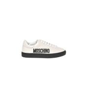 Verhoog je sneaker game met logo-gegraveerde sneakers Moschino , Gray ...