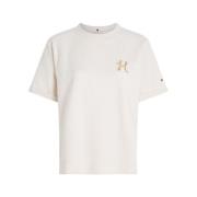 Eenvoudig en elegant T-shirt met korte mouwen en geborduurd logo Tommy...