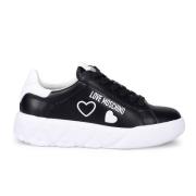 Zwarte Leren Sneakers voor Stijlvol Comfort Love Moschino , Black , Da...