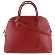 Pre-owned Leather handbags Hermès Vintage , Red , Dames