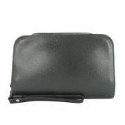 Pre-owned Leather clutches Louis Vuitton Vintage , Green , Dames