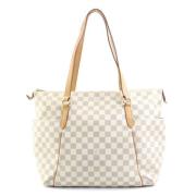 Pre-owned Canvas shoulder-bags Louis Vuitton Vintage , Beige , Dames