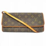 Pre-owned Canvas clutches Louis Vuitton Vintage , Brown , Dames