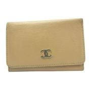 Pre-owned Leather key-holders Chanel Vintage , Beige , Dames