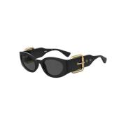 Zwart Goud Zonnebril met Grijze Lenzen Moschino , Black , Unisex