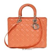 Pre-owned Cotton handbags Dior Vintage , Orange , Dames