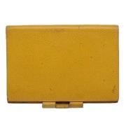 Pre-owned Leather wallets Hermès Vintage , Yellow , Dames