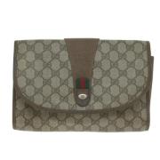 Pre-owned Canvas clutches Gucci Vintage , Beige , Dames