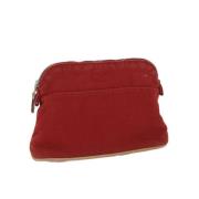 Pre-owned Canvas pouches Hermès Vintage , Red , Dames