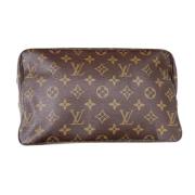 Pre-owned Leather clutches Louis Vuitton Vintage , Brown , Dames