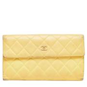 Pre-owned Leather wallets Chanel Vintage , Yellow , Dames