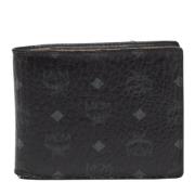 Pre-owned Coated canvas wallets MCM Pre-owned , Black , Dames