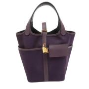 Pre-owned Canvas handbags Hermès Vintage , Purple , Dames