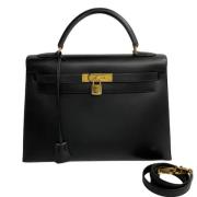 Pre-owned Leather crossbody-bags Hermès Vintage , Black , Dames