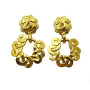 Pre-owned Metal earrings Chanel Vintage , Yellow , Dames