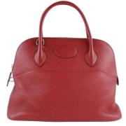 Pre-owned Leather handbags Hermès Vintage , Red , Dames