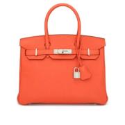 Pre-owned Leather handbags Hermès Vintage , Orange , Dames