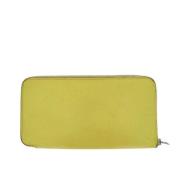 Pre-owned Leather wallets Hermès Vintage , Yellow , Dames