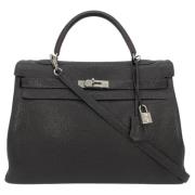 Pre-owned Leather handbags Hermès Vintage , Black , Dames