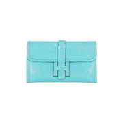 Pre-owned Leather clutches Hermès Vintage , Blue , Dames