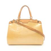 Pre-owned Leather handbags Louis Vuitton Vintage , Yellow , Dames