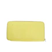 Pre-owned Leather wallets Hermès Vintage , Yellow , Dames