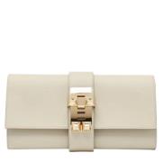 Pre-owned Leather clutches Hermès Vintage , Beige , Dames