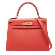 Pre-owned Leather handbags Hermès Vintage , Red , Dames