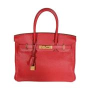 Pre-owned Leather handbags Hermès Vintage , Red , Dames