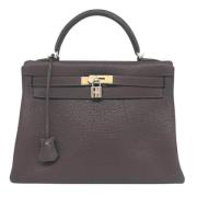 Pre-owned Leather handbags Hermès Vintage , Brown , Dames