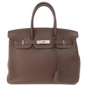 Pre-owned Leather handbags Hermès Vintage , Brown , Dames