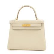 Pre-owned Leather handbags Hermès Vintage , Beige , Dames