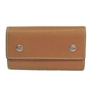 Pre-owned Leather key-holders Hermès Vintage , Brown , Unisex