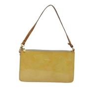 Pre-owned Leather clutches Louis Vuitton Vintage , Beige , Dames