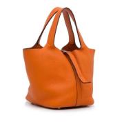 Pre-owned Leather totes Hermès Vintage , Orange , Dames