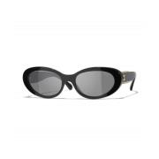 Gepolariseerde zonnebril in zwart en grijs Chanel , Black , Dames