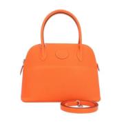 Pre-owned Fabric shoulder-bags Hermès Vintage , Orange , Dames