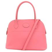 Pre-owned Fabric handbags Hermès Vintage , Pink , Dames