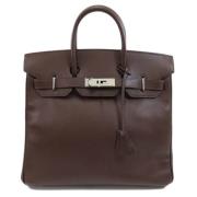 Pre-owned Fabric handbags Hermès Vintage , Brown , Dames