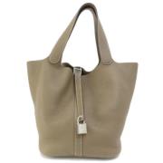 Pre-owned Leather handbags Hermès Vintage , Beige , Dames