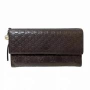 Pre-owned Fabric wallets Gucci Vintage , Brown , Dames