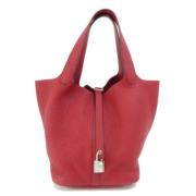 Pre-owned Leather handbags Hermès Vintage , Red , Dames