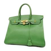 Pre-owned Fabric handbags Hermès Vintage , Green , Dames