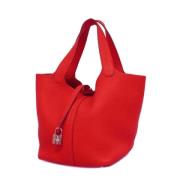 Pre-owned Fabric handbags Hermès Vintage , Red , Dames