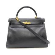 Pre-owned Fabric handbags Hermès Vintage , Black , Dames