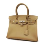 Pre-owned Fabric handbags Hermès Vintage , Beige , Dames